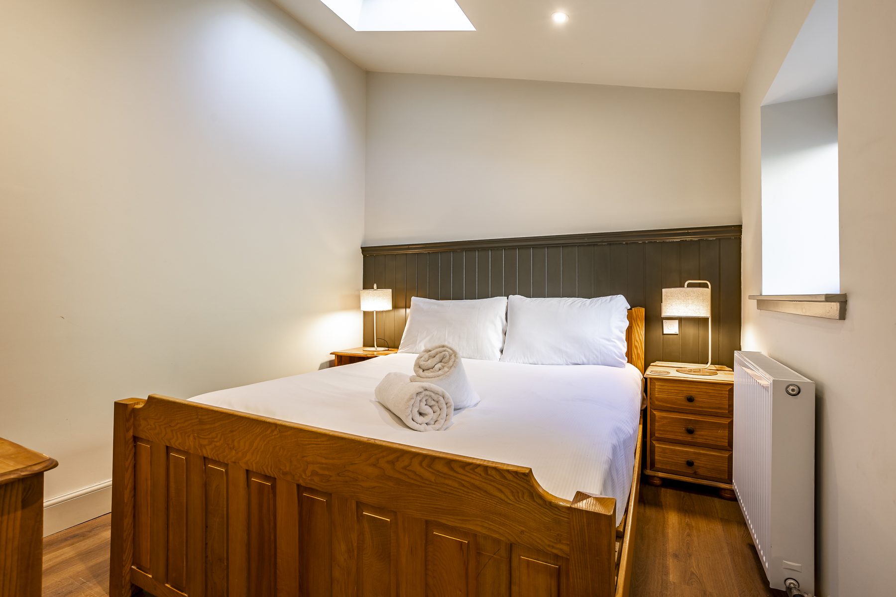 Bedroom with wooden bed frame
